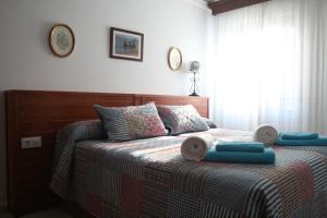 A bed or beds in a room at CASA PALACIO LAS PALOMAS