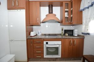 A kitchen or kitchenette at CASA PALACIO LAS PALOMAS