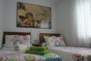 A bed or beds in a room at CASA PALACIO LAS PALOMAS
