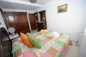 A bed or beds in a room at CASA PALACIO LAS PALOMAS