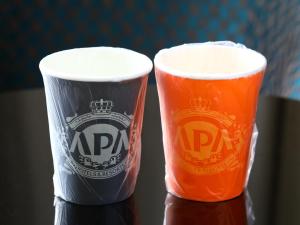 two cups of beer sitting next to each other at APA Hotel Keikyukamata Ekimae in Tokyo