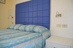 Postel nebo postele na pokoji v ubytování Park Hotel Perù ***S