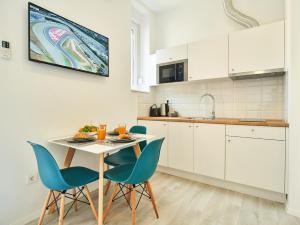 Kuchyňa alebo kuchynka v ubytovaní Porta Downtown Apartments by Irundo