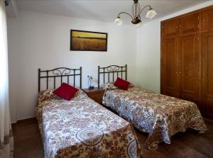 Postel nebo postele na pokoji v ubytování Casa Carrillo