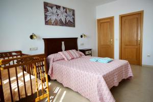 Postel nebo postele na pokoji v ubytování Casa Carrillo