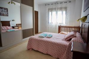 Postel nebo postele na pokoji v ubytování Casa Carrillo