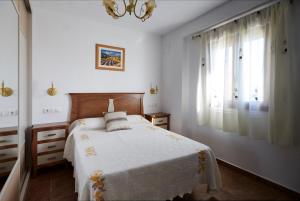 Postel nebo postele na pokoji v ubytování Casa Carrillo