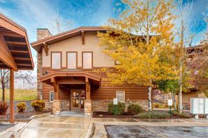 a home with a wooden house at Cozy Crestview Condo in Park City