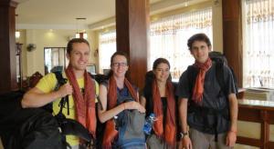 a group of people are posing for a picture at Asia Hotel in Battambang