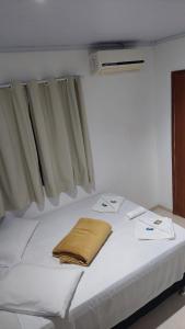 Postel nebo postele na pokoji v ubytování Pousada Vila Mar