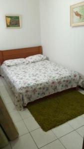 Krevet ili kreveti u jedinici u okviru objekta Excelente apto em Caiobá a 3 quadras da praia!