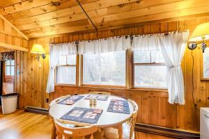 a dining room with a table and chairs at Rustic Camp in Greenville