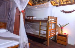 Krevet ili kreveti na kat u jedinici u objektu Primaluna Beach Hostel