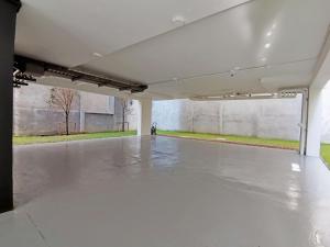 a large empty room with a concrete floor at The Lantern Hatyai Hotel in Hat Yai