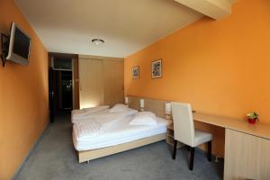 Krevet ili kreveti u jedinici u okviru objekta Hotel Faraon