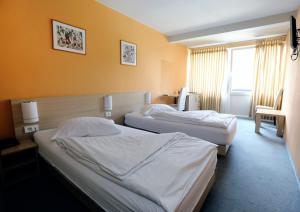 Krevet ili kreveti u jedinici u okviru objekta Hotel Faraon