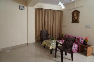Posezení v ubytování Shimla Pines Homestay