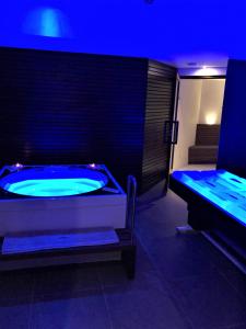 a bathroom with a jacuzzi tub in a room at Hotel Mirasole International in Gaeta