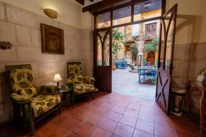 Posezení v ubytování Hostal Loreto