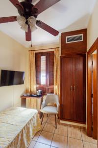 TV a/nebo společenská místnost v ubytování Hostal Loreto