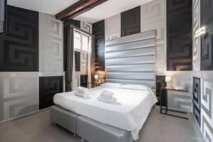 Postel nebo postele na pokoji v ubytování Hotel Deco