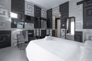 Postel nebo postele na pokoji v ubytování Hotel Deco