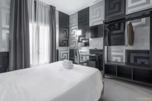 Postel nebo postele na pokoji v ubytování Hotel Deco