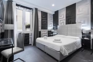 Postel nebo postele na pokoji v ubytování Hotel Deco