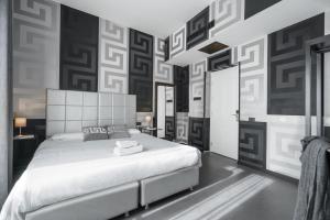 Postel nebo postele na pokoji v ubytování Hotel Deco