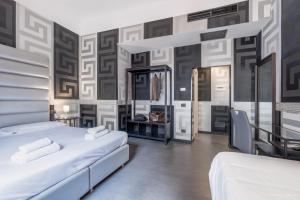 Postel nebo postele na pokoji v ubytování Hotel Deco