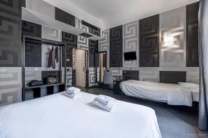Postel nebo postele na pokoji v ubytování Hotel Deco