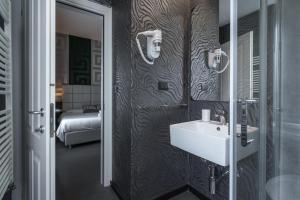 Koupelna v ubytování Hotel Deco