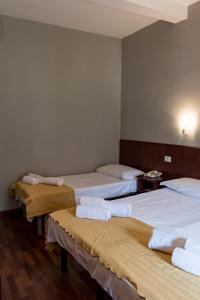 A bed or beds in a room at Antica Terrazza Frascati