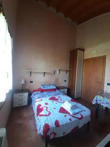 Postel nebo postele na pokoji v ubytování Agriturismo Trebis