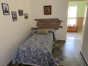 En eller flere senge i et værelse på Ermita del Carmen Híjar