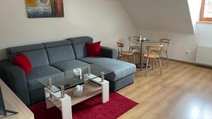 Predel za sedenje v nastanitvi Apartmany U Lva