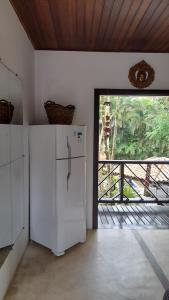 Virtuvė arba virtuvėlė apgyvendinimo įstaigoje Guest House da Lui