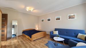 Posedenie v ubytovaní Apartament Parkowy Piątka