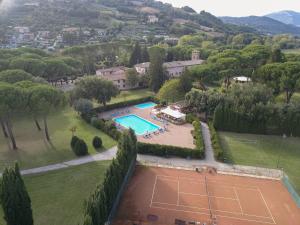 an aerial view of a tennis court in a park at Relais San Clemente in Perugia