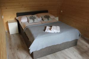 Posteľ alebo postele v izbe v ubytovaní Apartamenty Świstak Maciej Dunajczan