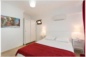 Postel nebo postele na pokoji v ubytování Ayka Hotel