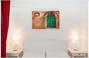 Postel nebo postele na pokoji v ubytování Ayka Hotel