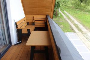 Balkón alebo terasa v ubytovaní Apartamenty Świstak Maciej Dunajczan