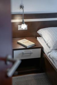 A bed or beds in a room at Apartment Amelia Tale, View of Chopok from large terrace, In the nature