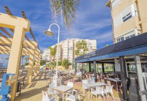 En restaurant eller et andet spisested på Cubo's Urban Beach Algarrobo