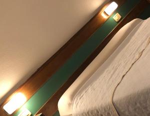 Cama ou camas em um quarto em Palace Hotel Mendoza