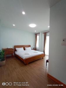 Una cama o camas en una habitación de Hi Q View Pua
