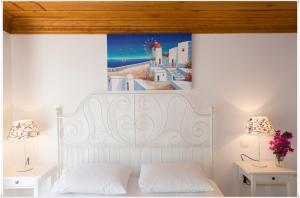 Postel nebo postele na pokoji v ubytování Ayka Hotel