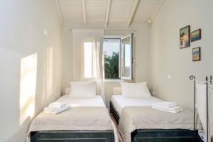 Posteľ alebo postele v izbe v ubytovaní Hammock House