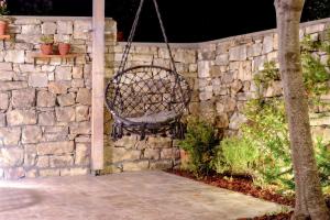 Vonkajšia záhrada v ubytovaní Hammock House